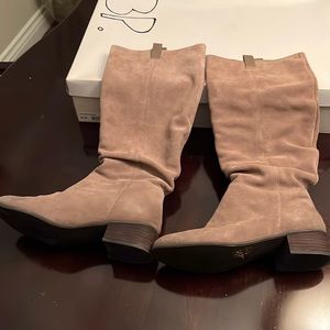 Beige suede tall boots size 8 1/2 in a good condition but runs small